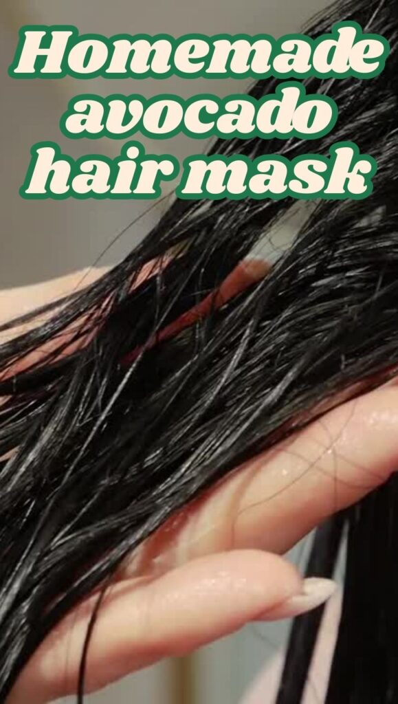 A DIY hair mask being applied to long hair.